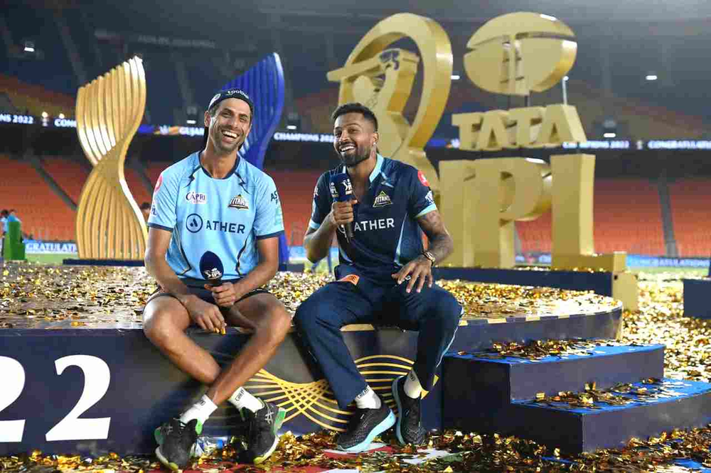 IPL 2022_ Ashish Nehra, Hardik Pandya celebrating Gujarat Titans' maiden Title in IPL _ Walking Wicket (Source_ ©BCCI_IPL)