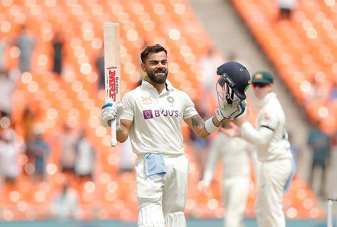 Border Gavaskar Trophy 2022-23, India vs Australia, 4th Test, Day 4_ Virat Kohli raises his bat as he smashes 28th Test century_ Walking Wicket (Images_ ©BCCI_Twitter)